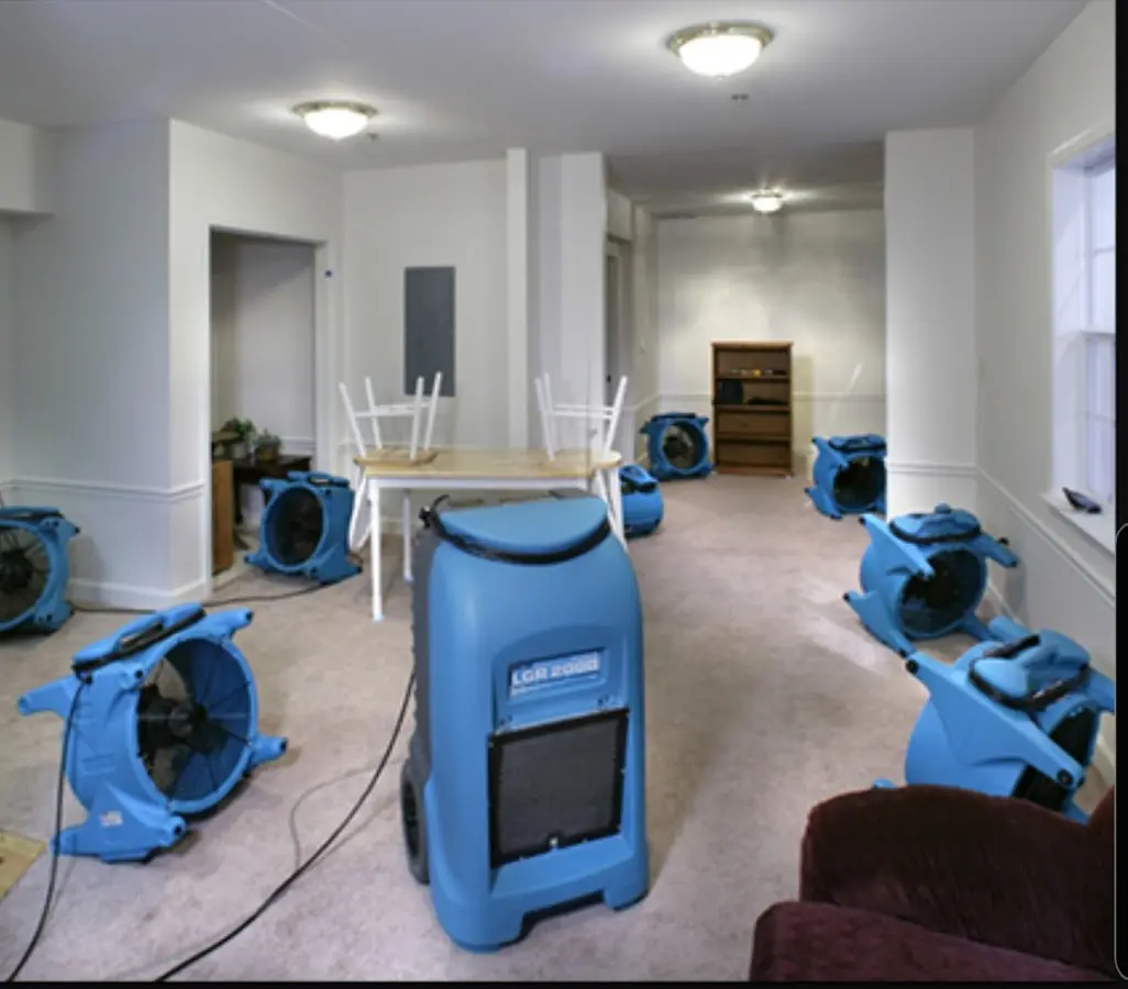 Air movers and dehumidifier setup for Water Damage Restoration in O'Fallon